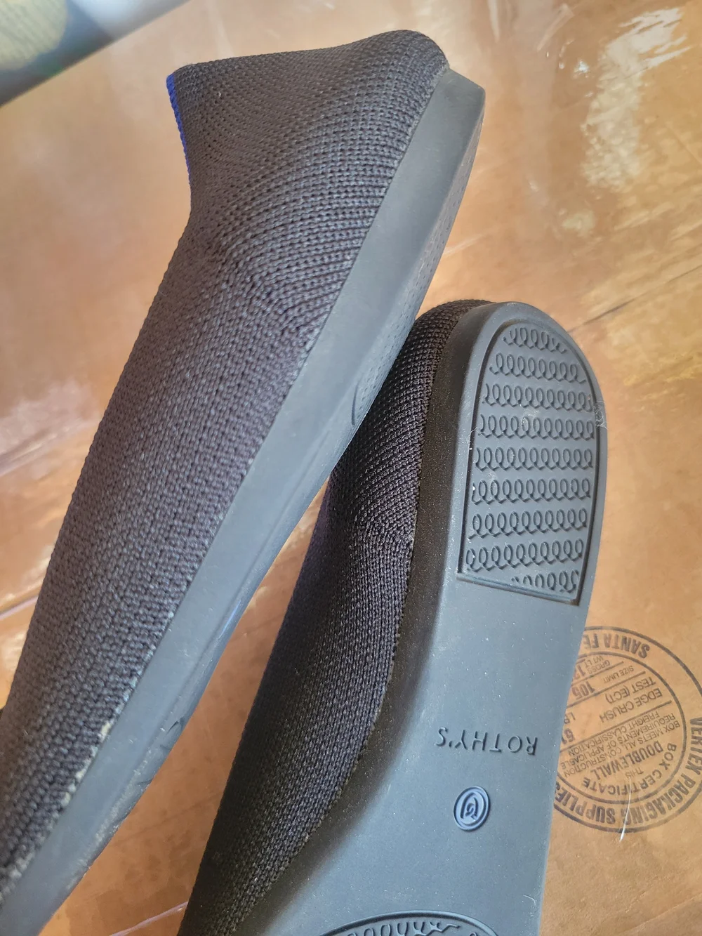 Rothy's Black Pointed Ballet Flat with Blue Trim